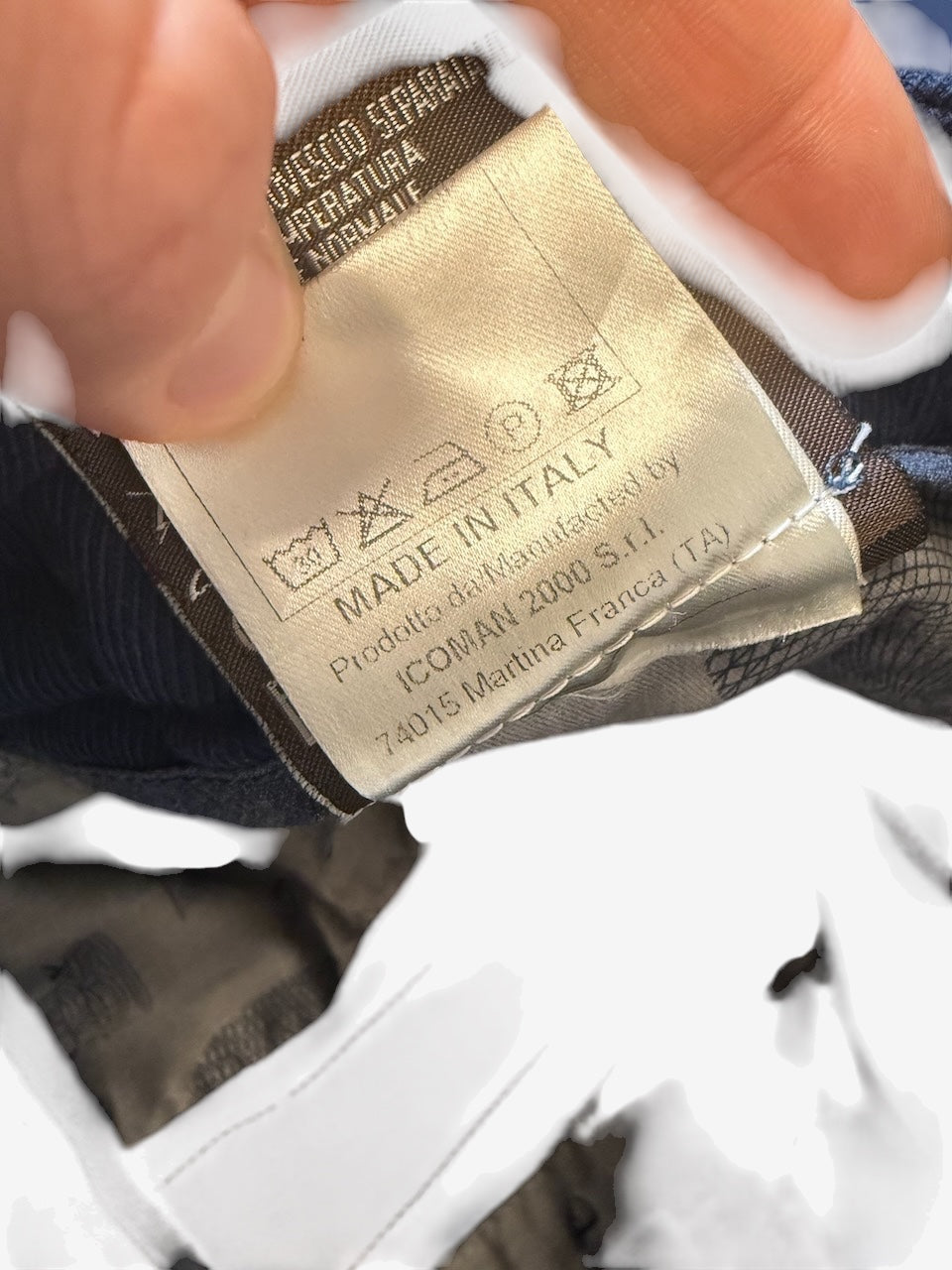 Nordic Jeans Co. BERWICH tailored trousers interior care label showing Made in Italy and manufacturer details