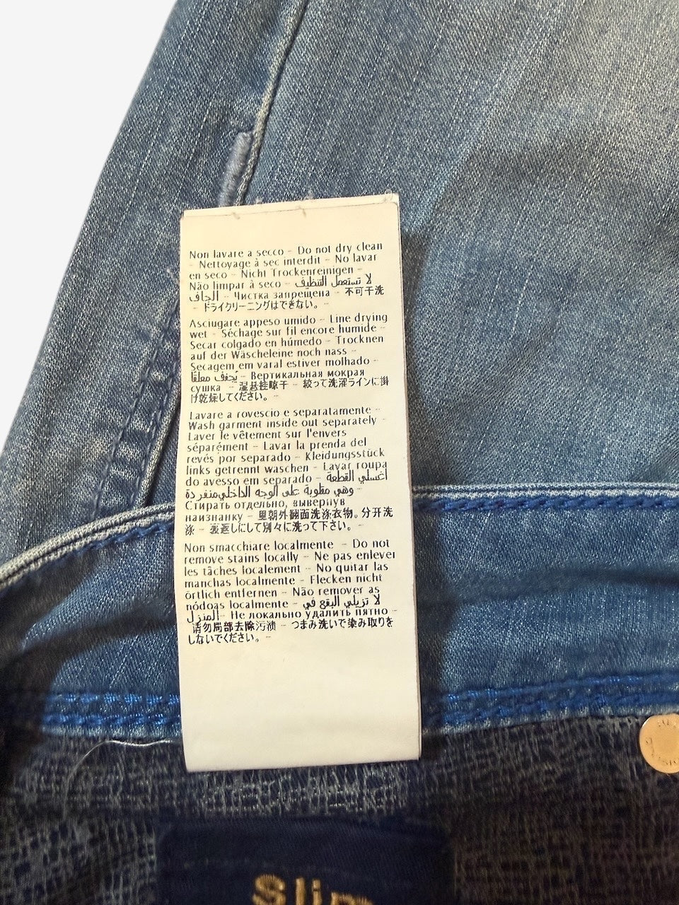 Nordic Jeans Co. Incotex Blue Division denim jeans care label with multi-language washing instructions