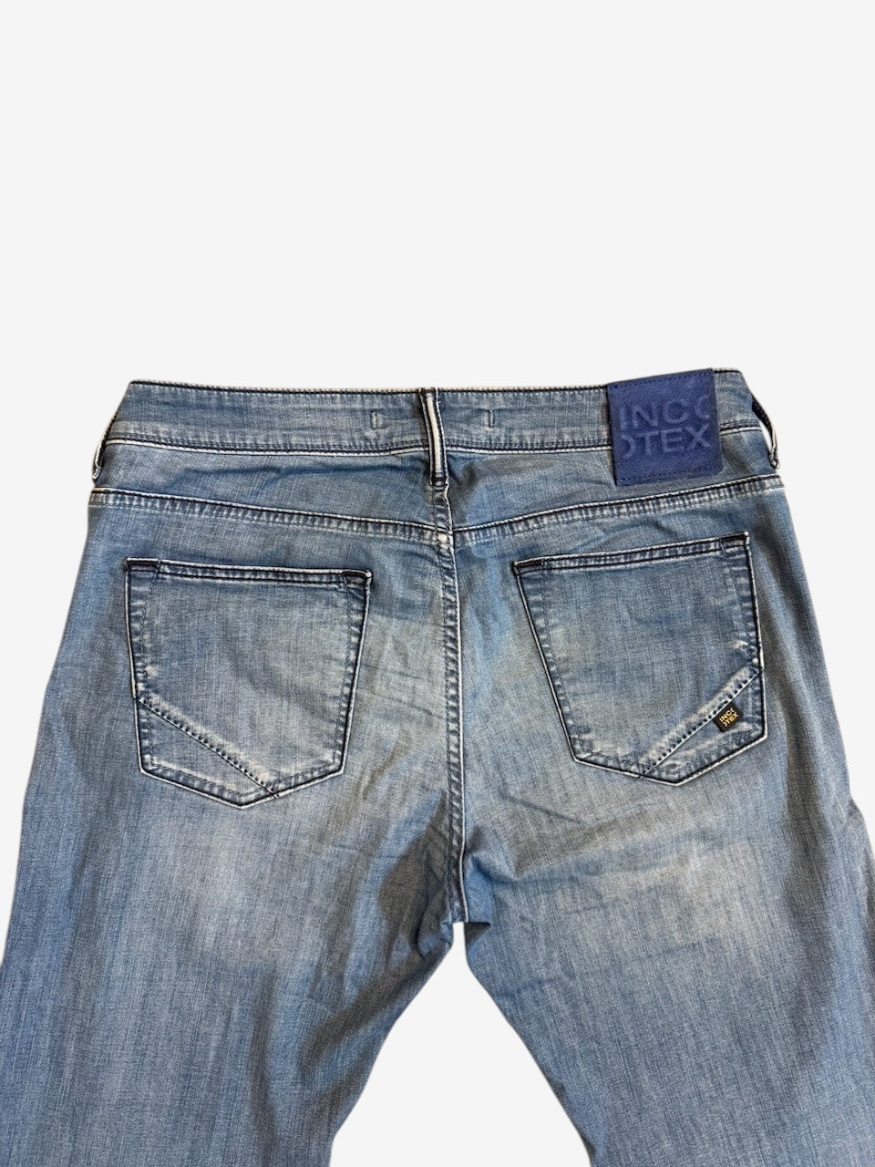 Nordic Jeans Co. Incotex Blue Division light wash denim jeans with signature back patch and five-pocket design