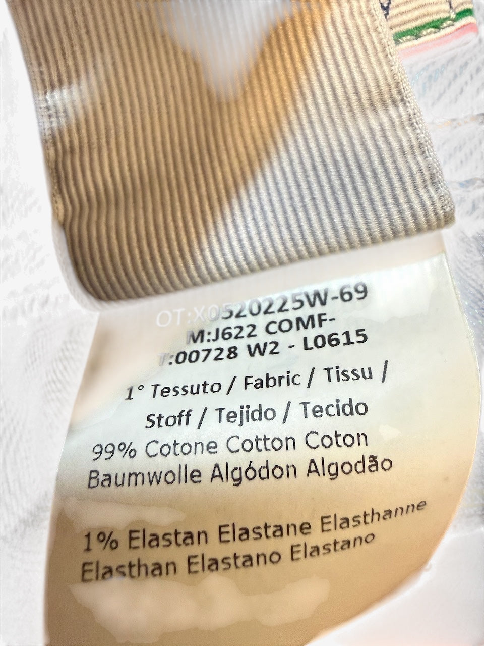 Nordic Jeans Co. Jacob Cohën J622 denim jeans care label showing 99 percent cotton and 1 percent elastane composition