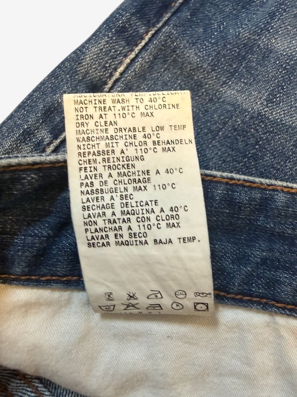 Nordic Jeans Co. Mauro Grifoni Rocco denim jeans care label with washing instructions in multiple languages