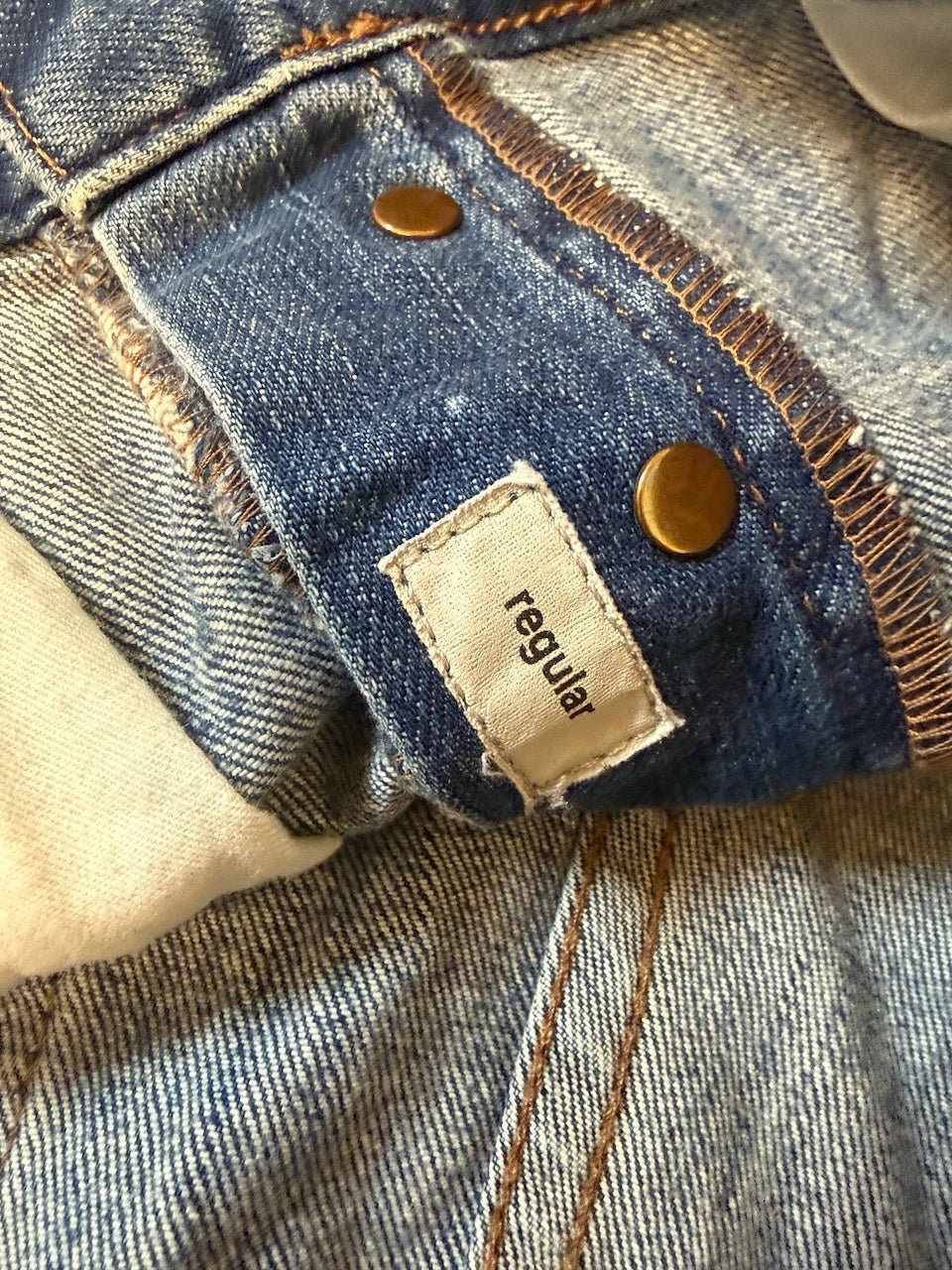 Nordic Jeans Co. Mauro Grifoni Rocco regular fit denim jeans showing interior waistband label and button fly detail
