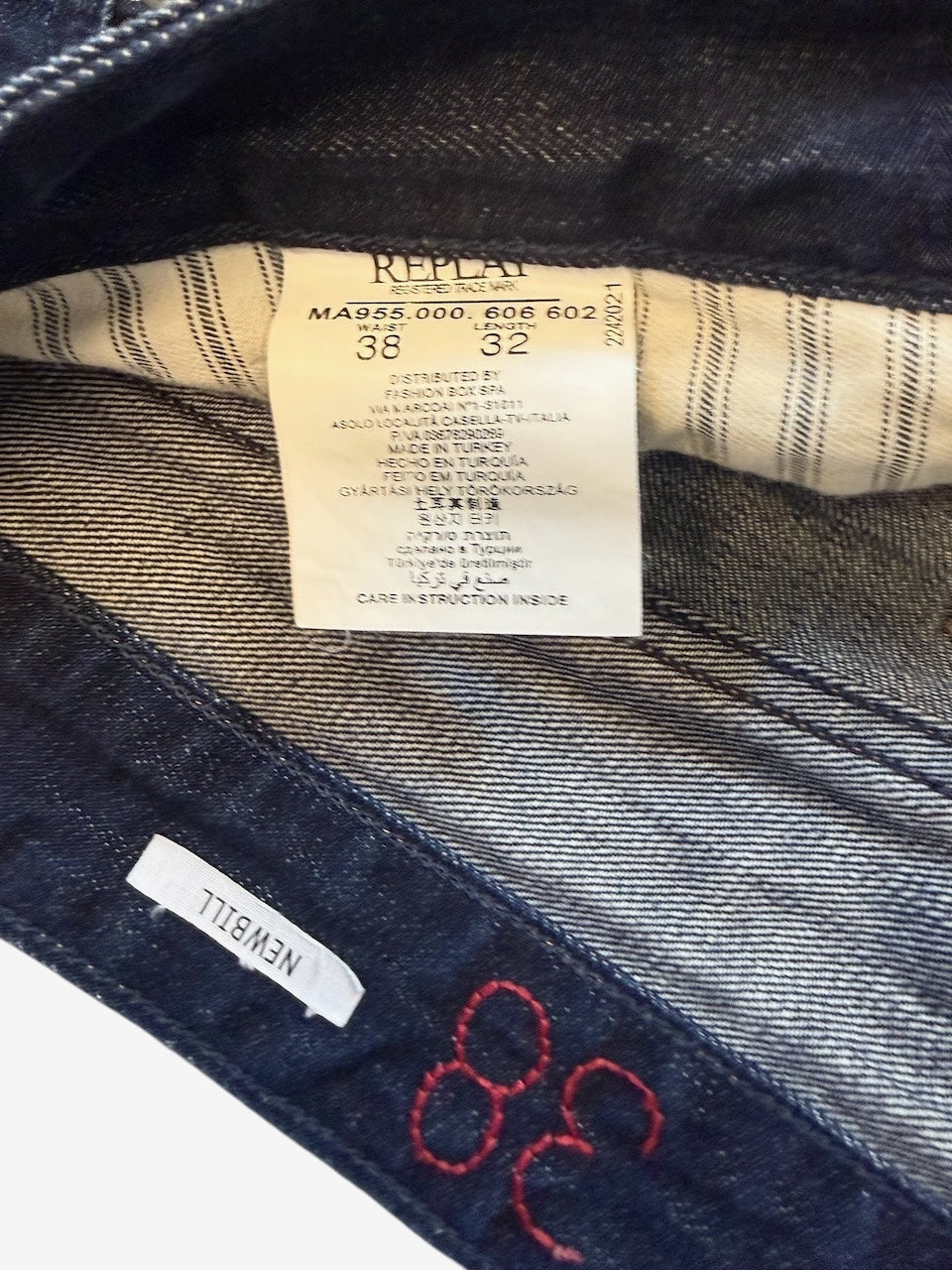 Nordic Jeans Co. REPLAY Newbill denim jeans interior label showing size 38 32 and brand details