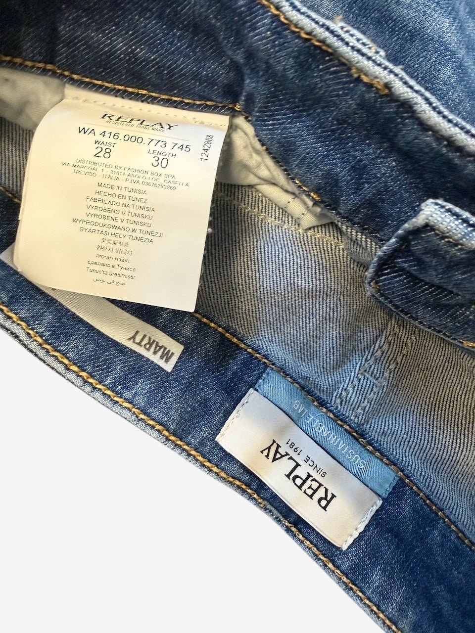 Nordic Jeans Co. REPLAY Marty regular fit denim jeans interior label and branding details in medium blue wash
