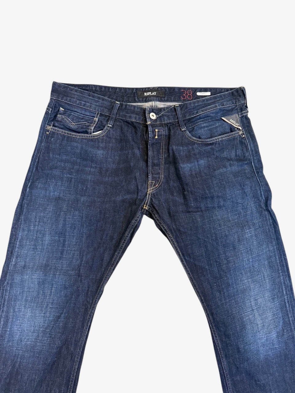 Nordic Jeans Co. REPLAY Newbill regular fit denim jeans in dark indigo wash with subtle fading and contrast stitching.