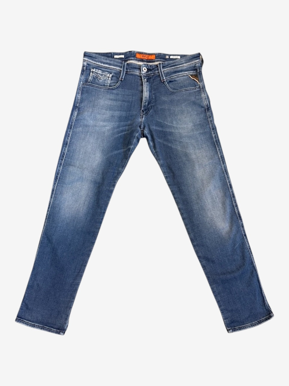 Nordic Jeans Co. REPLAY Joe slim fit denim jeans in a medium blue wash with subtle fading and classic five-pocket style.