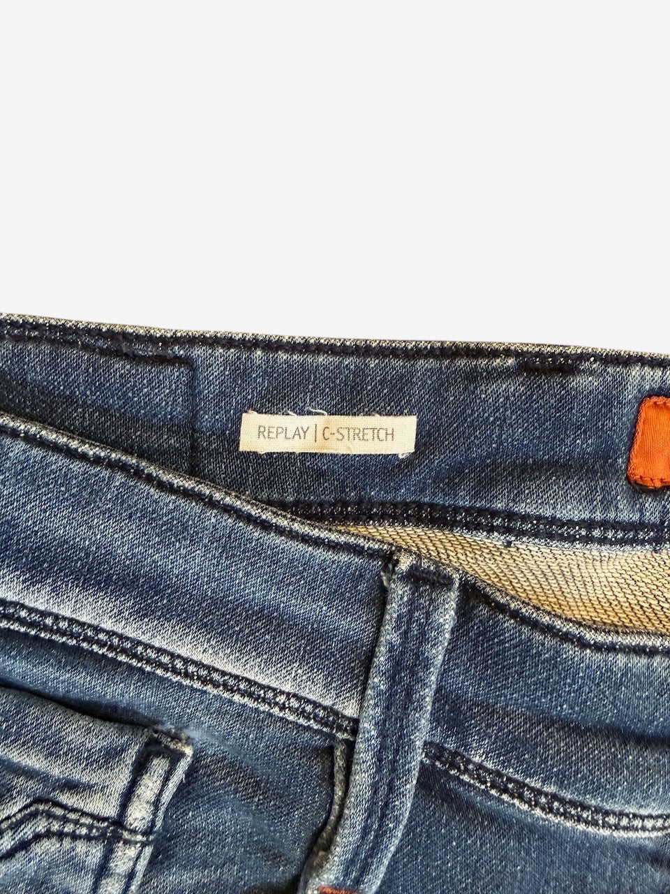 Nordic Jeans Co. REPLAY Joe slim fit denim jeans featuring C-Stretch technology label on the inner waistband