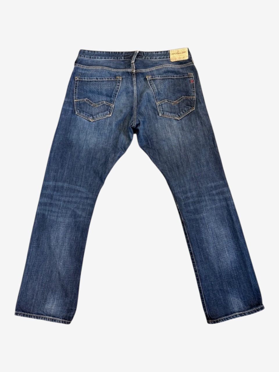 Nordic Jeans Co. Replay Waitom regular fit denim jeans in medium-wash blue with back pocket stitching and leather patch