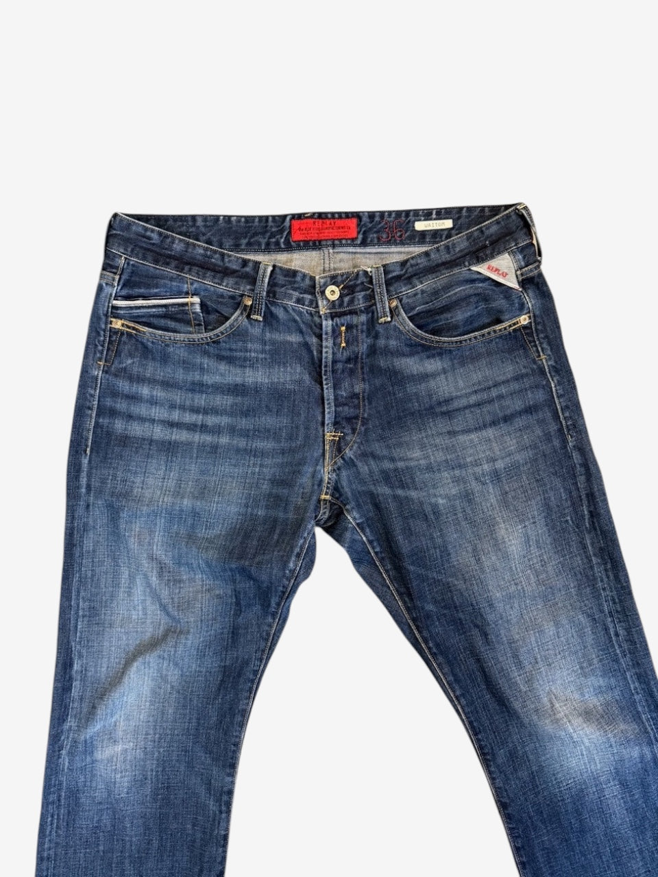 Nordic Jeans Co. REPLAY Waitom regular fit medium-wash blue denim jeans with button fly and signature branding.