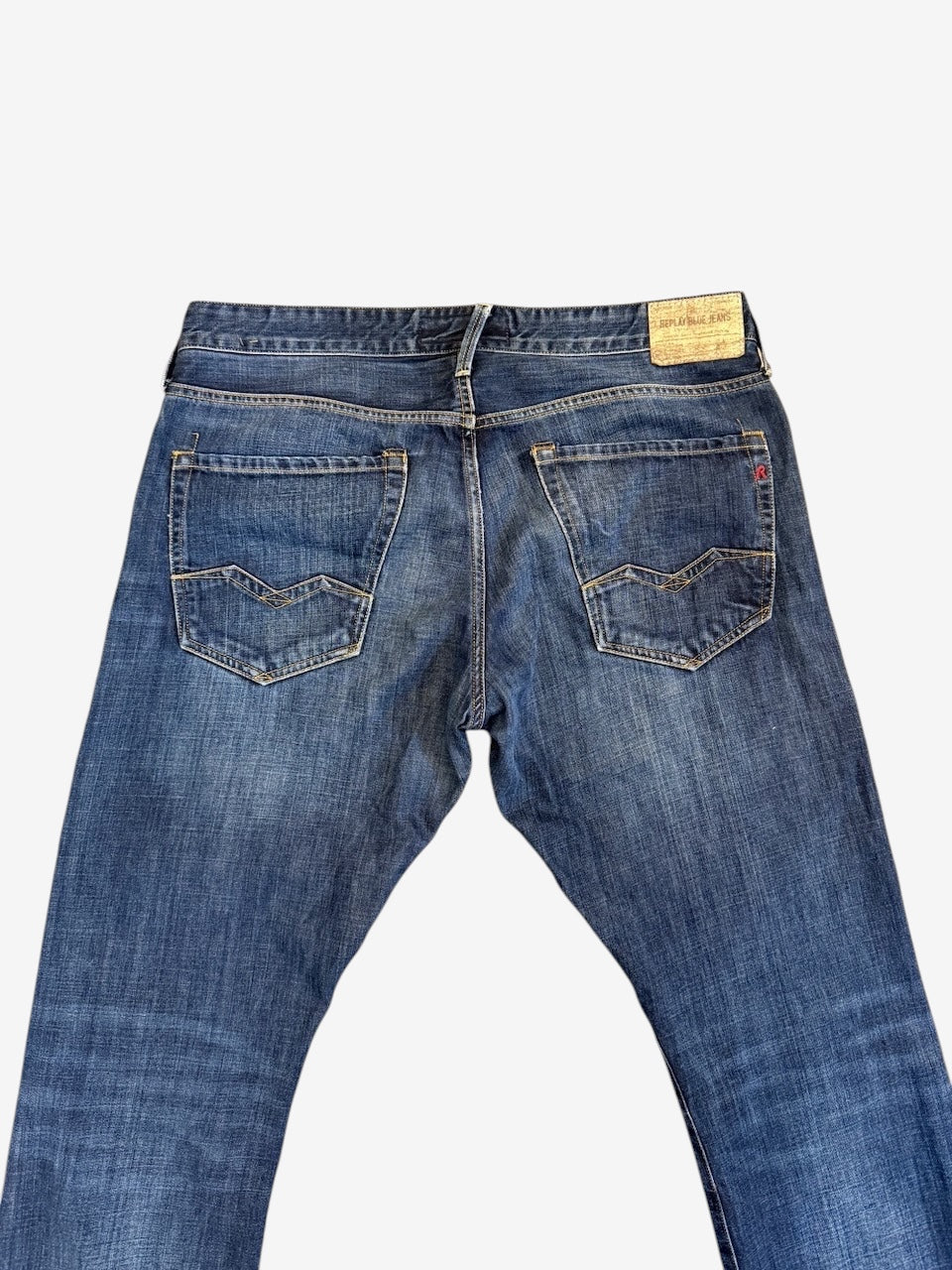 Nordic Jeans Co. REPLAY Waitom regular fit denim jeans in medium-wash blue with back pocket stitching and leather patch