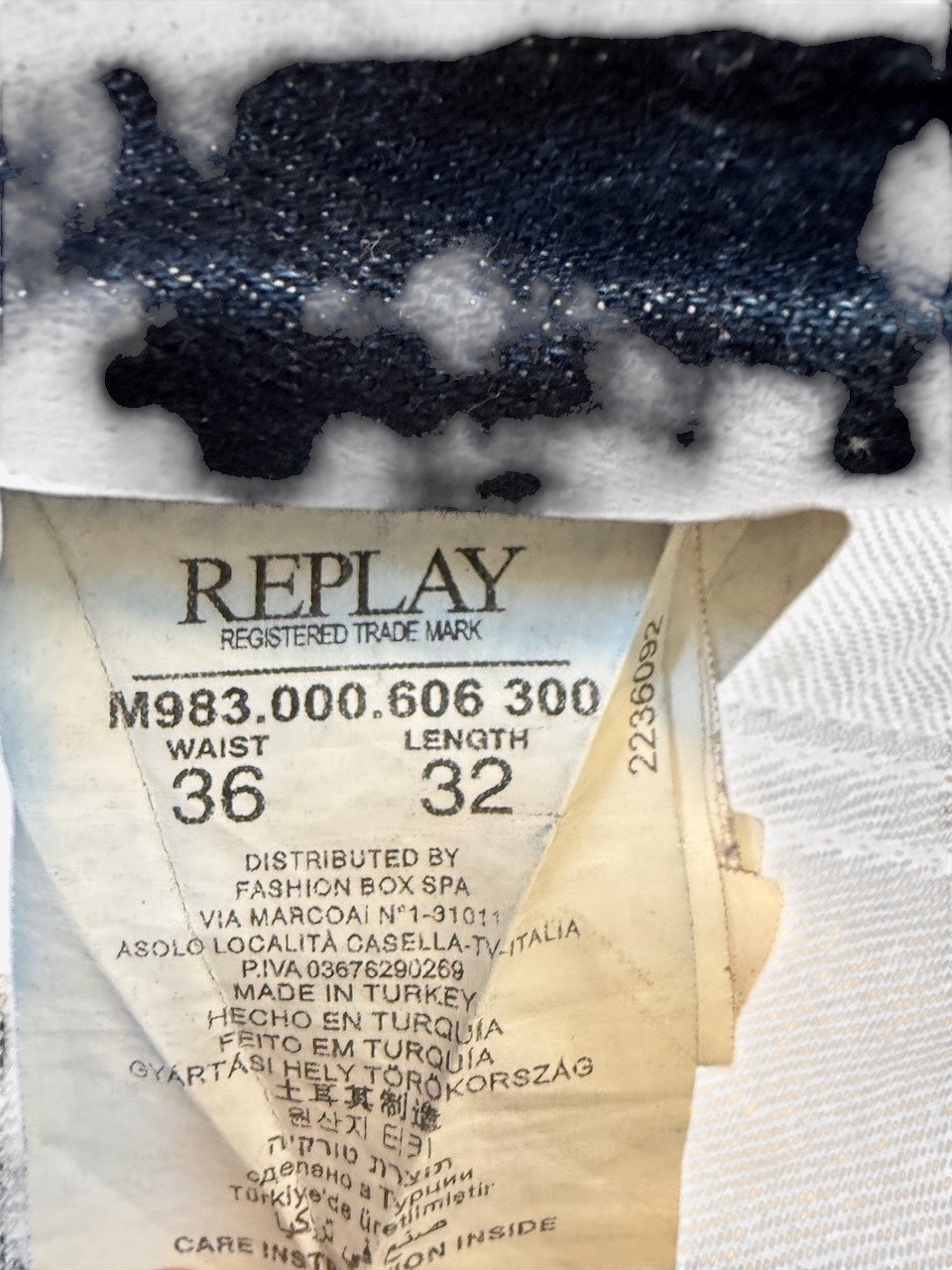 Nordic Jeans Co. REPLAY Waitom denim jeans inner garment label showing size 36 waist and 32 length details